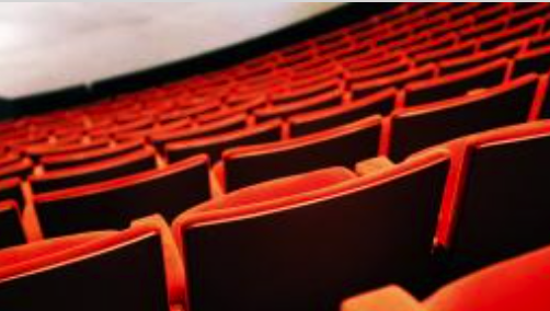 image of red seats in theatre